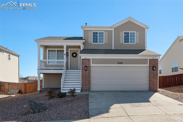 view of front of property with a garage