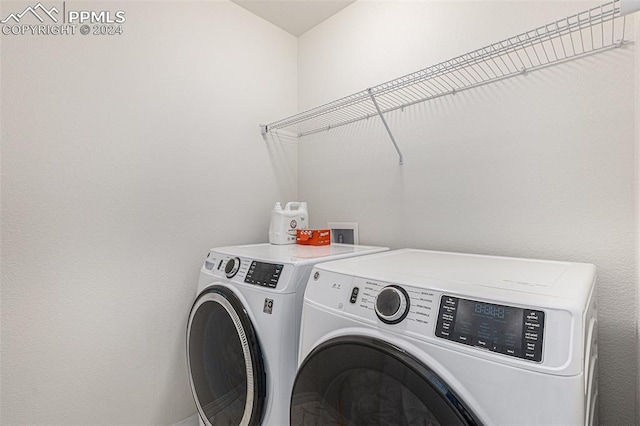 laundry room featuring washer and dryer