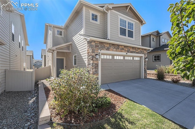 view of front of property featuring a garage