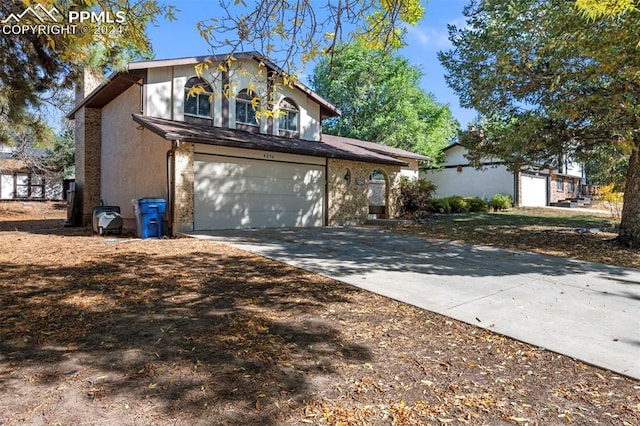 view of front of property with a garage