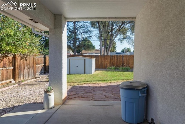 view of patio / terrace with a storage unit