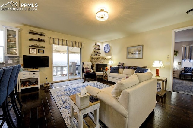 living room with dark wood-type flooring