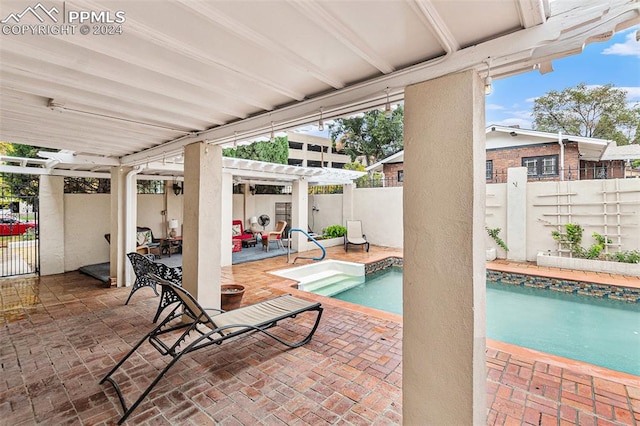 view of pool with a pergola and a patio area