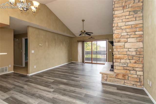 unfurnished living room with high vaulted ceiling, wood-type flooring, and ceiling fan with notable chandelier