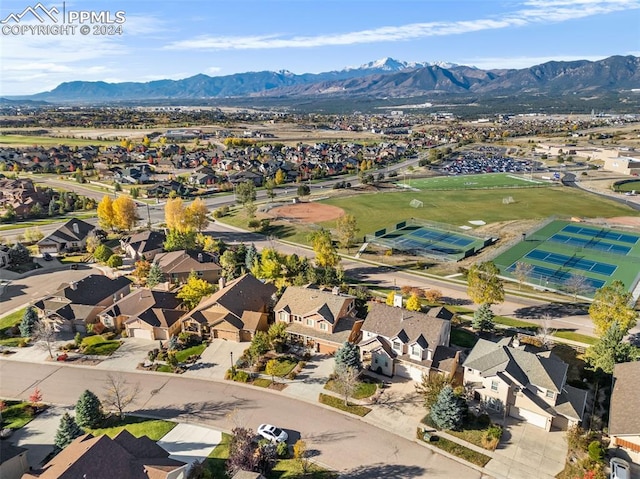 drone / aerial view featuring a mountain view