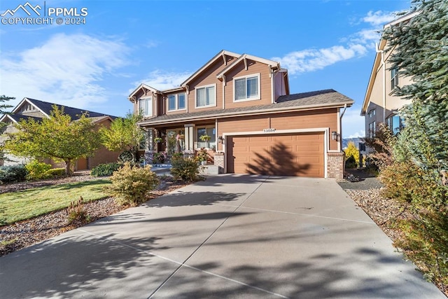 craftsman-style house featuring a garage