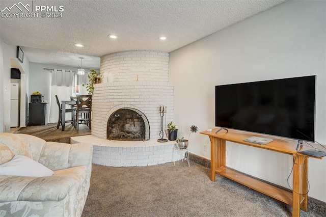 living room featuring a textured ceiling, carpet floors, and a brick fireplace