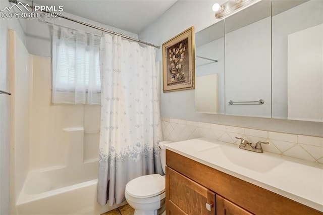 full bathroom featuring vanity, toilet, and shower / tub combo