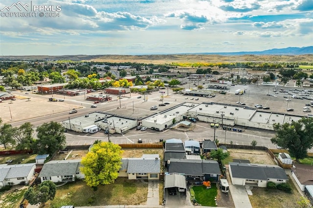 birds eye view of property featuring a mountain view