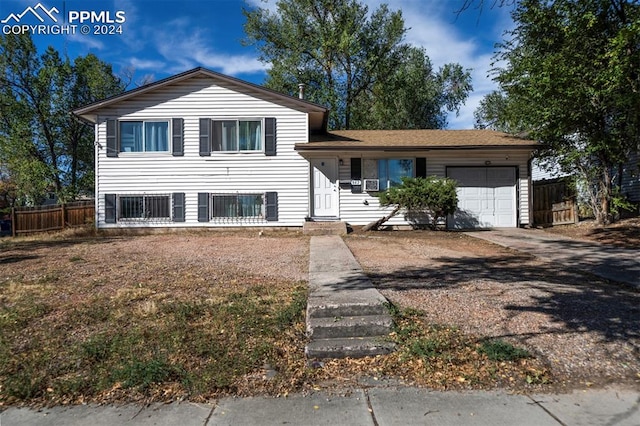 split level home with a garage