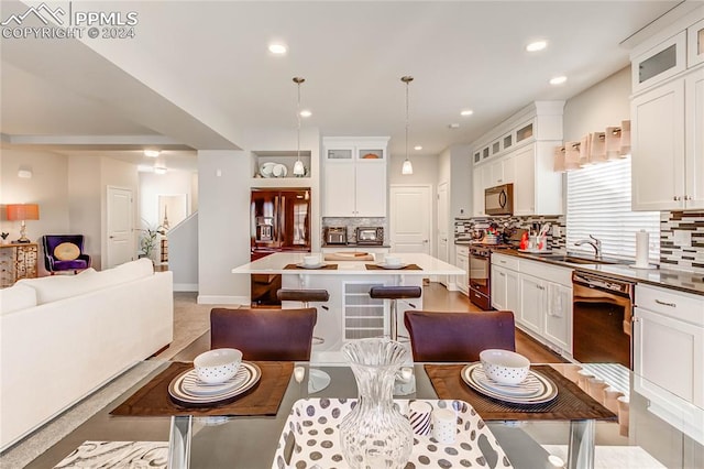 dining space featuring sink