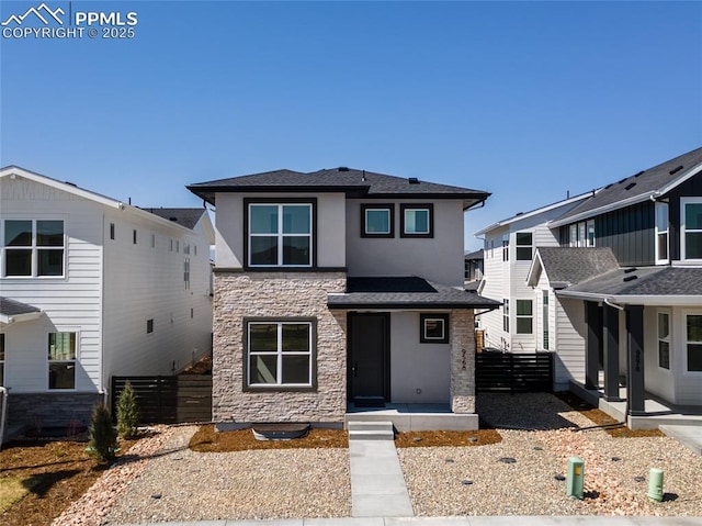 9568 Wolf Valley Dr, Colorado Springs, CO 80924 - view of front of house featuring stucco siding and stone siding
