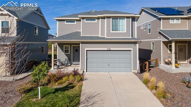 view of front of property featuring a garage