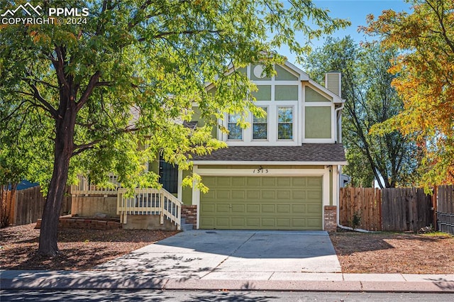 view of front of property featuring a garage