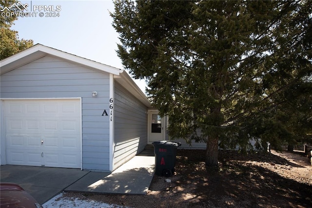 view of home's exterior featuring a garage