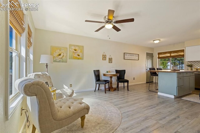 interior space with light hardwood / wood-style floors and ceiling fan