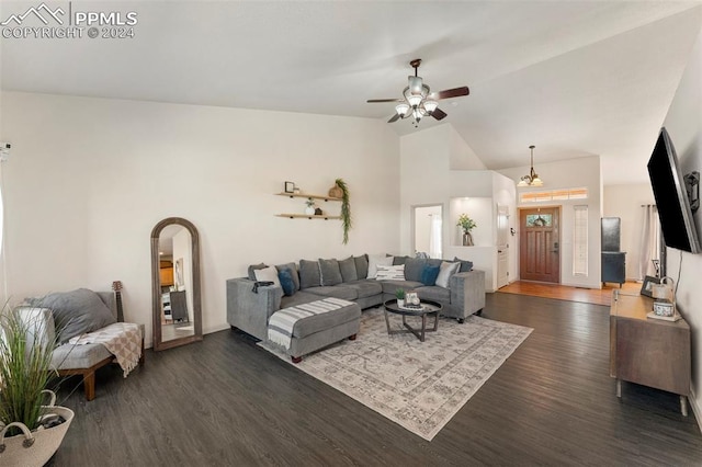 living room with dark wood-type flooring, high vaulted ceiling, and ceiling fan