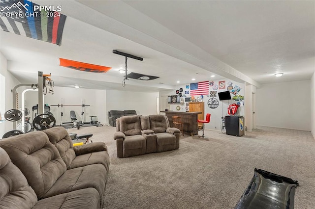 living room with indoor bar and carpet flooring