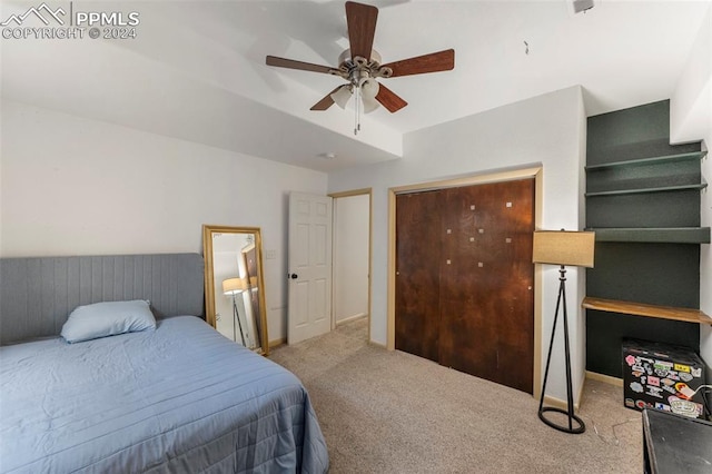 bedroom with light colored carpet and ceiling fan