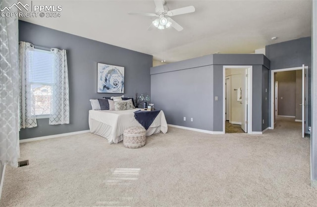 carpeted bedroom with ceiling fan