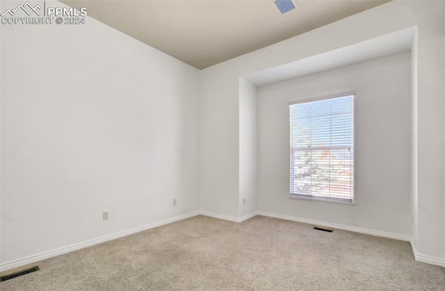 view of carpeted spare room