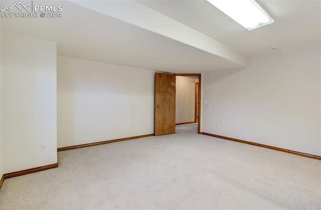 empty room with carpet flooring