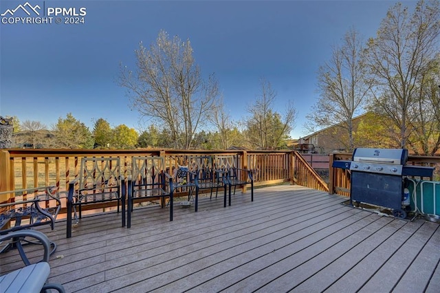 wooden terrace with grilling area