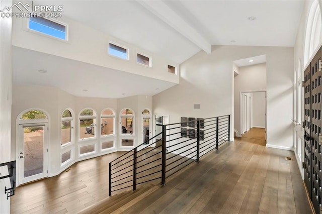 corridor featuring high vaulted ceiling, beamed ceiling, and dark hardwood / wood-style flooring