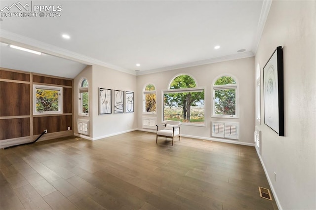 interior space with dark wood-type flooring and crown molding