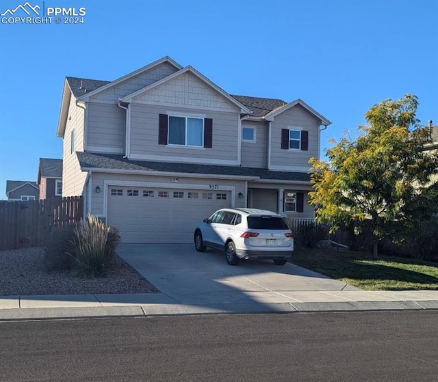 view of front of property featuring a garage