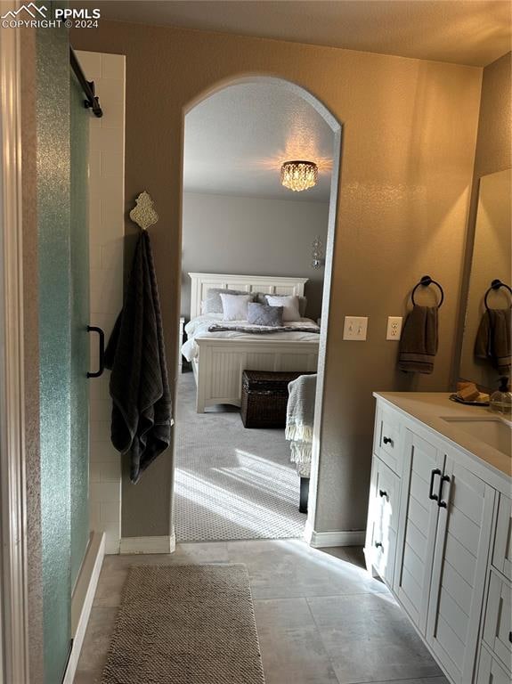 bathroom with vanity and an enclosed shower