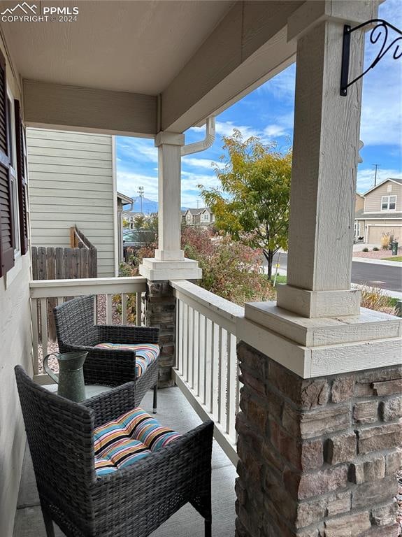 balcony featuring a porch