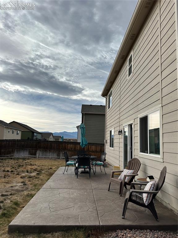 view of patio / terrace featuring a mountain view