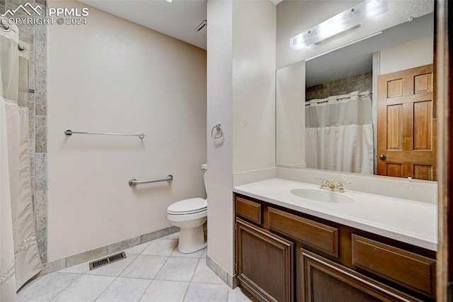 bathroom featuring vanity, toilet, a shower with curtain, and tile patterned flooring