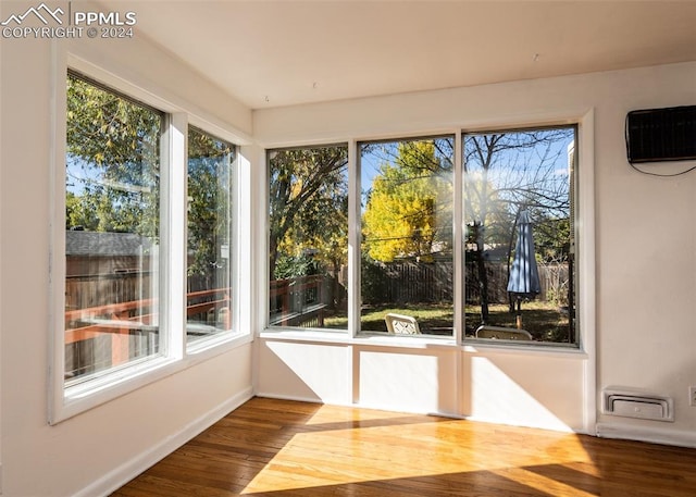 unfurnished sunroom with plenty of natural light