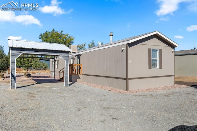 view of home's exterior with a shed