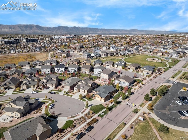 drone / aerial view featuring a mountain view