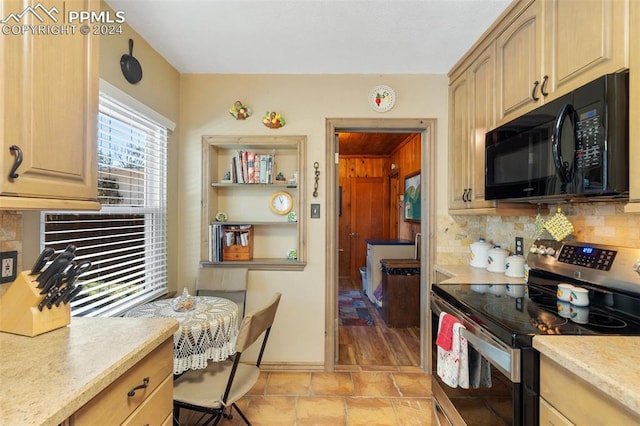 kitchen with stainless steel range with electric stovetop, light wood-type flooring, light brown cabinetry, and tasteful backsplash