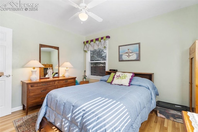 bedroom featuring light hardwood / wood-style flooring and ceiling fan