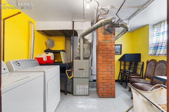 washroom featuring independent washer and dryer and decorative columns