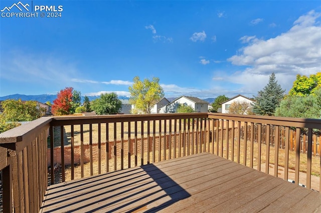 wooden terrace with a mountain view