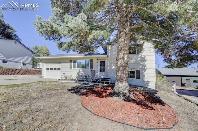 split level home featuring a garage