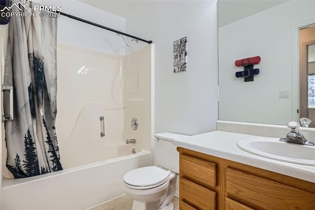 full bathroom with vanity, toilet, and shower / bath combo