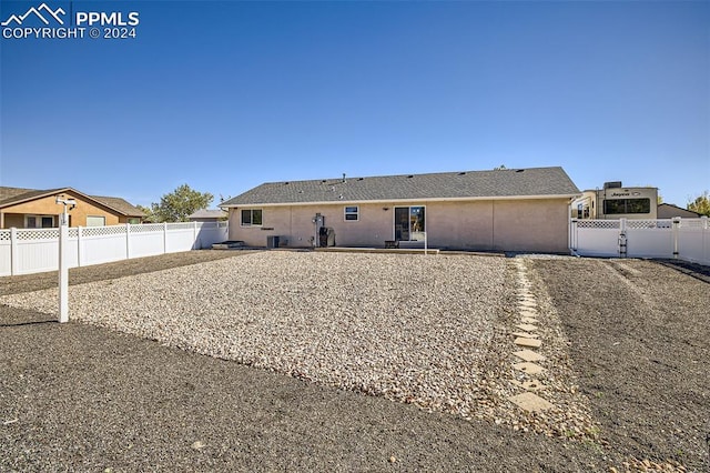 back of house with a patio area