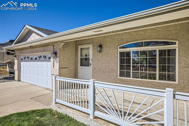 property entrance featuring a garage