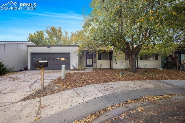 view of front of property with a garage