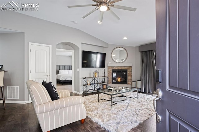 living room featuring ceiling fan, dark hardwood / wood-style flooring, and lofted ceiling