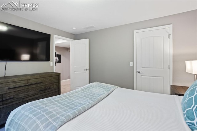 bedroom featuring wood-type flooring