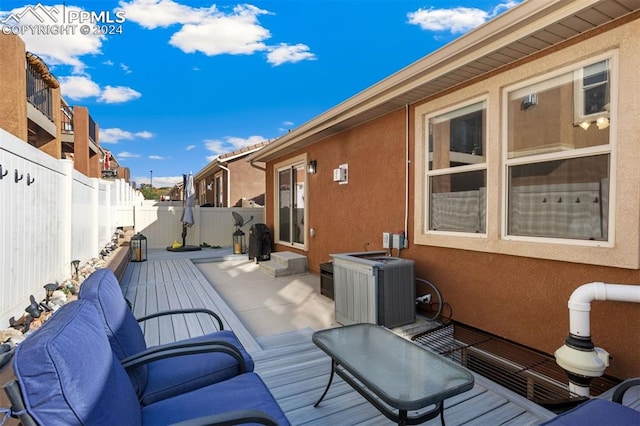 wooden terrace with central AC unit