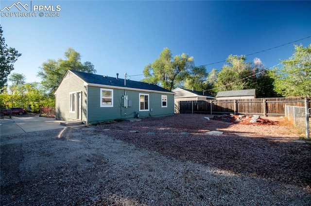 back of house featuring a patio area